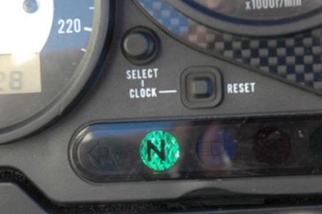 When lit, the green warning light marked N on the instrument panel tells the rider that: