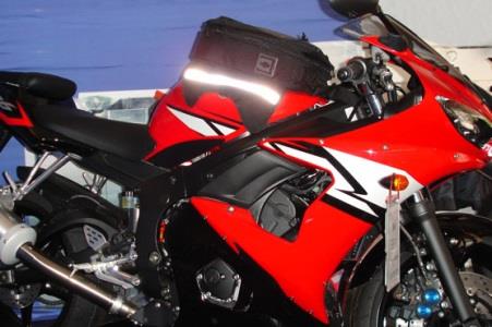 When riding a motorcycle, spilt diesel on the road can: