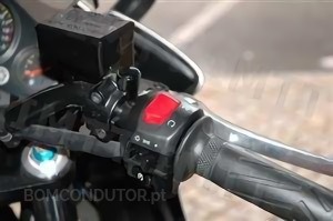 The emergency engine cut-off switch on a motorcycle has the function of: