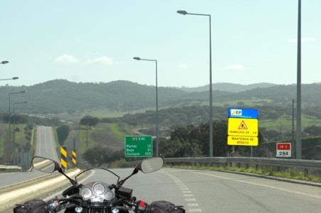 The green-background sign allows me to state that I am riding on a motorway.
