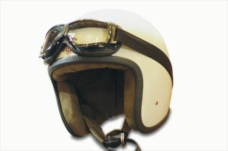 Is the use of protective glasses important when riding a motorcycle?